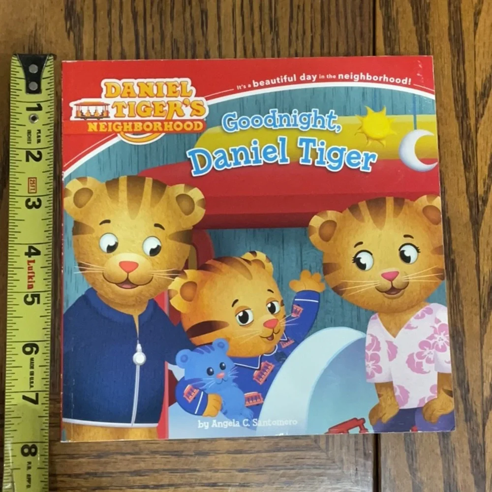 Books: Wheels on Bus, Tools Rule, I Grow Up, Daniel Tiger, Lego Superhero, Poky